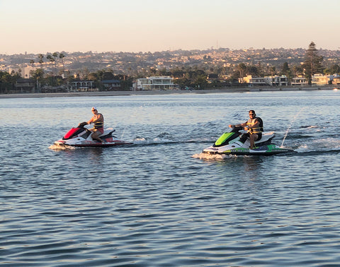 2 guys riding jet skis in Mission Bay