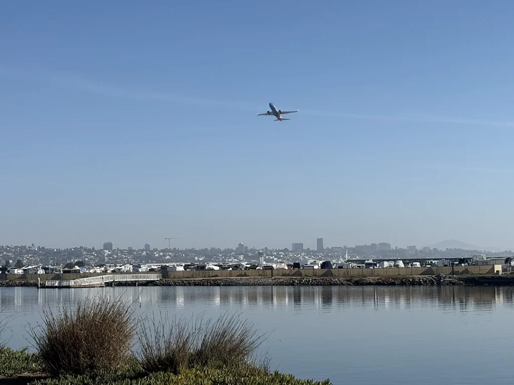 Commercial aircraft approach over San Diego metropolitan area